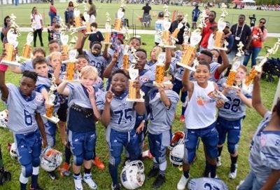 PHOTOS: Youth football league brings community, families to the field